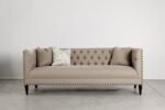 Three-Seater Sofa Upholstered With Beige Button-Back Details