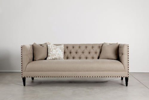 TemiOVQkLGjZnp5gWFCuTHqCHYql8P63VSPnbe5T Three-Seater Sofa Upholstered With Beige Button-Back Details - Image 1