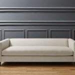 كنبة ثلاث مقاعد اوف وايت بمساند يد وظهر متصلة