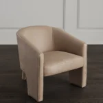 The Chair Was Made Of Beige Leather.