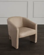 The Chair Was Made Of Beige Leather.